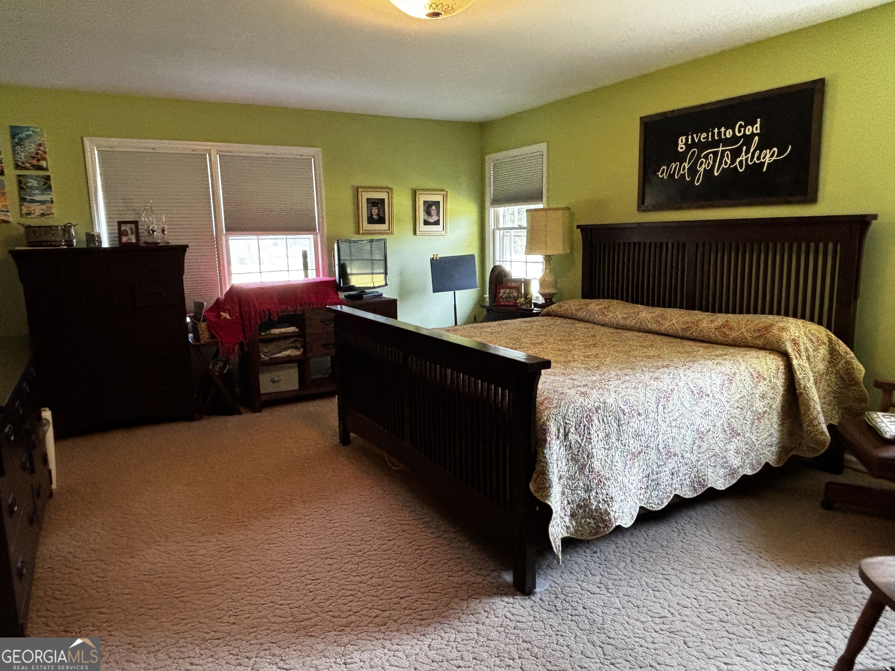207 Old Thomson Road Wrens, GA 30833 - Photo 27 of 46 a bedroom with a bed dresser and window