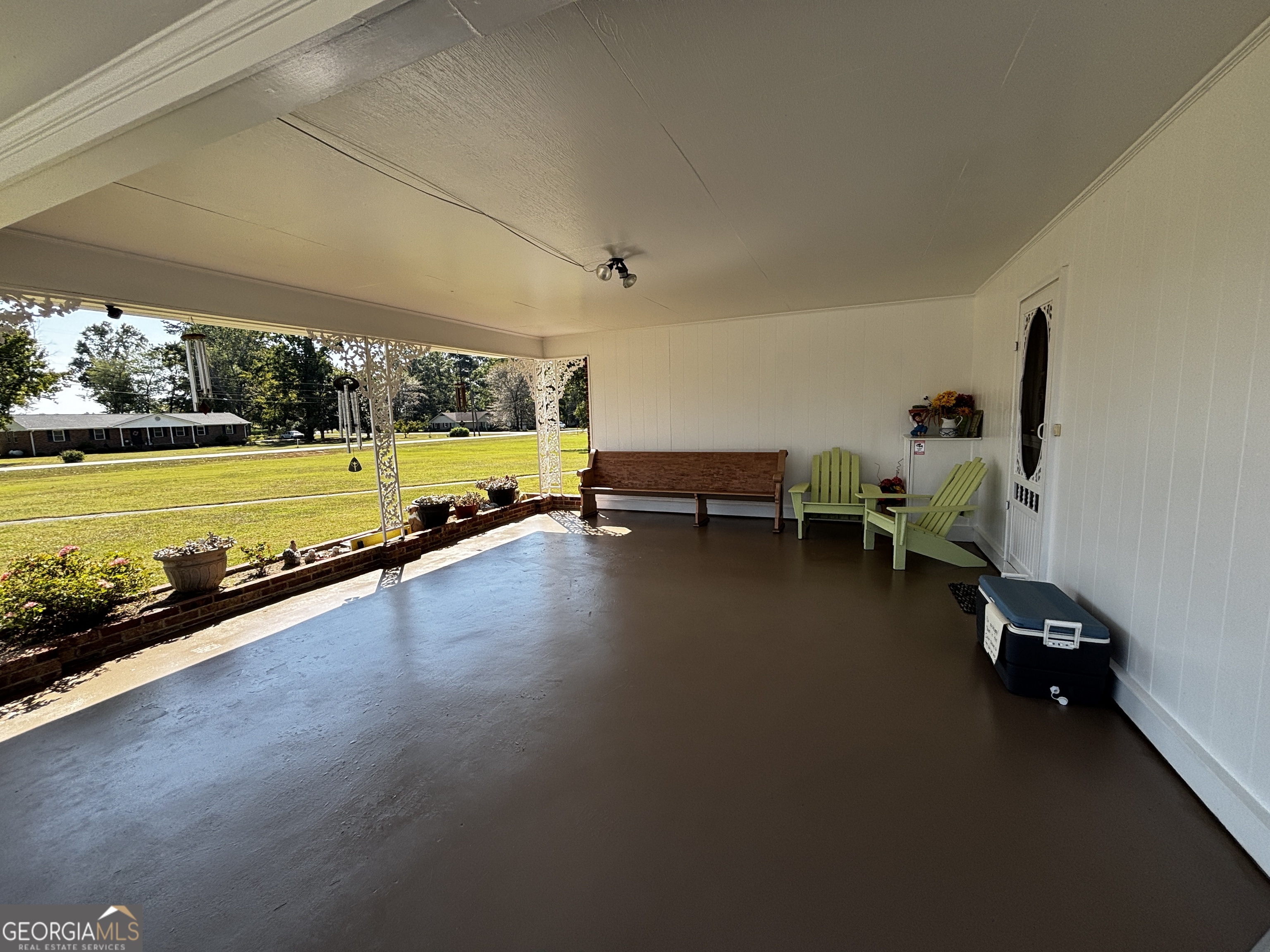 207 Old Thomson Road Wrens, GA 30833 - Photo 45 of 46 a swimming pool with outdoor seating and yard