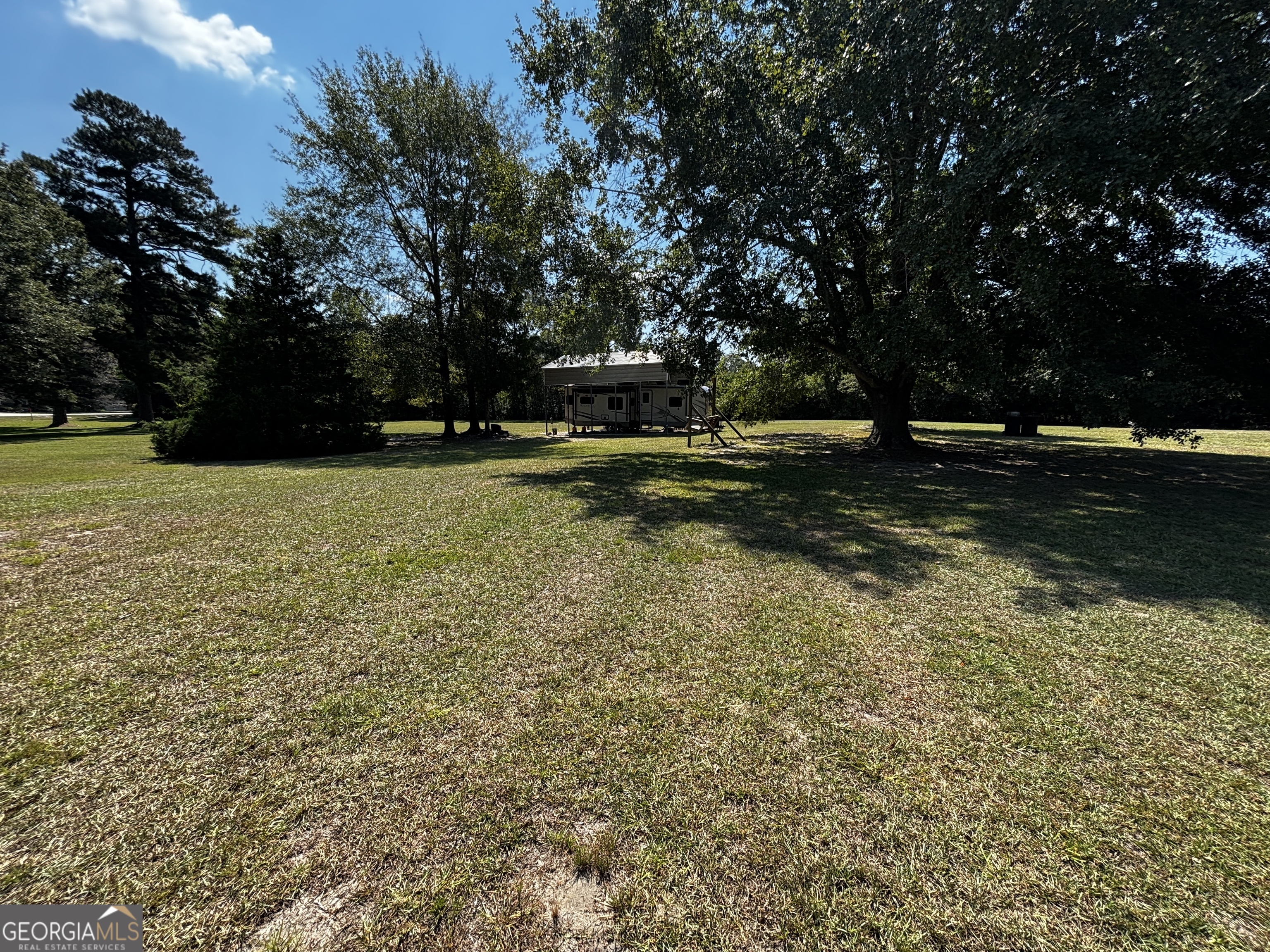 207 Old Thomson Road Wrens, GA 30833 - Photo 6 of 46 a view of a garden with trees