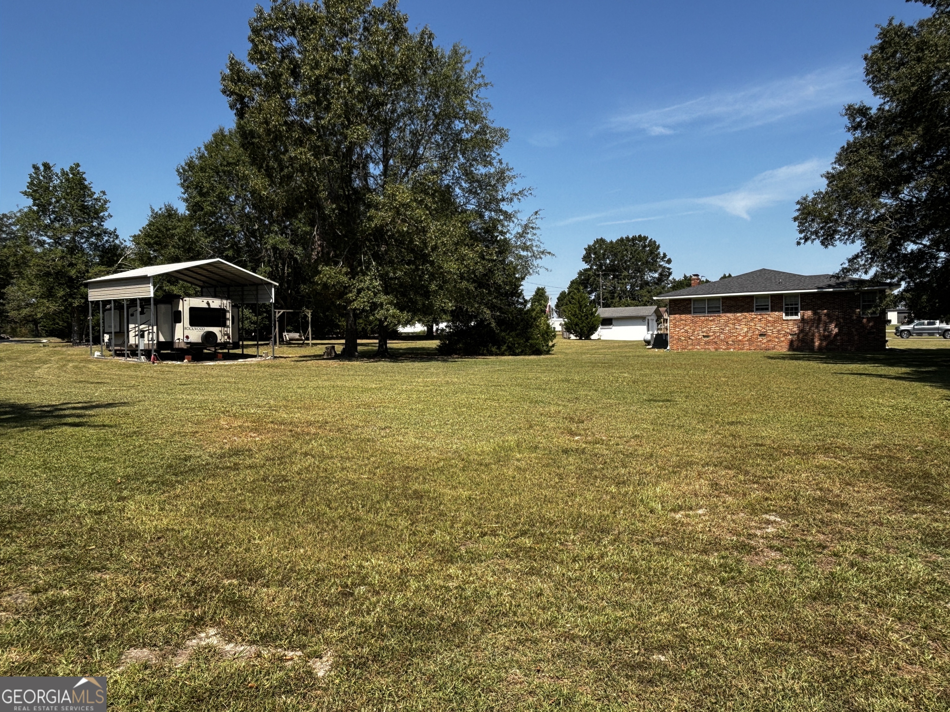207 Old Thomson Road Wrens, GA 30833 - Photo 10 of 46 a view of a swimming pool and outdoor space