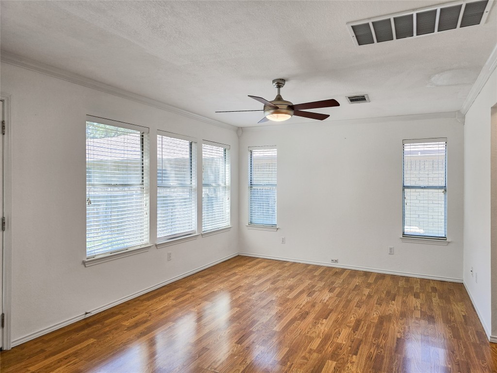 8021 Rimini Trail Austin, TX 78729 - Photo 11 of 26 a view of an empty room with a window
