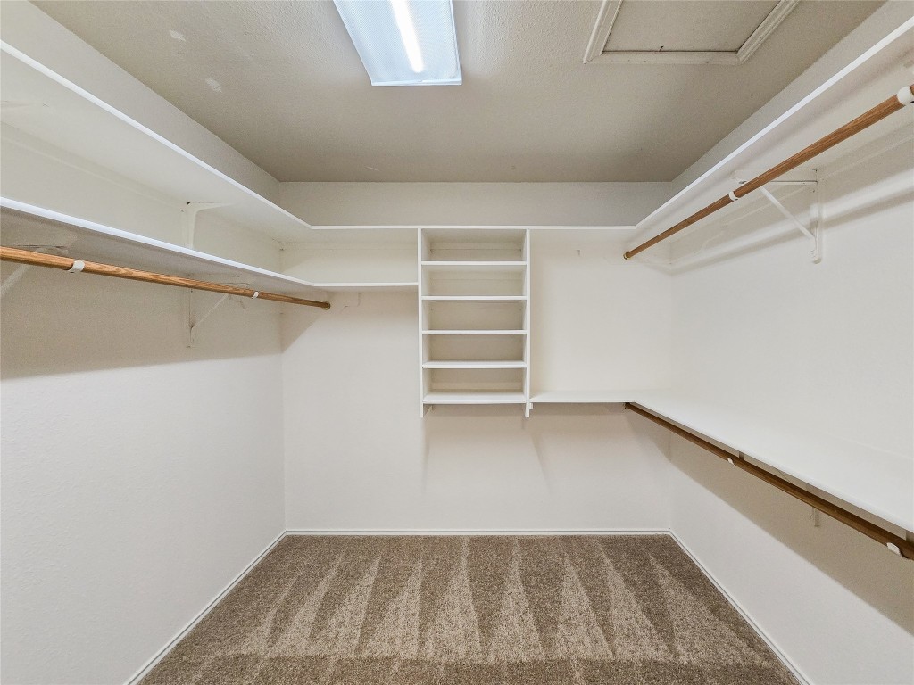 8021 Rimini Trail Austin, TX 78729 - Photo 21 of 26 a view of an empty walk in closet