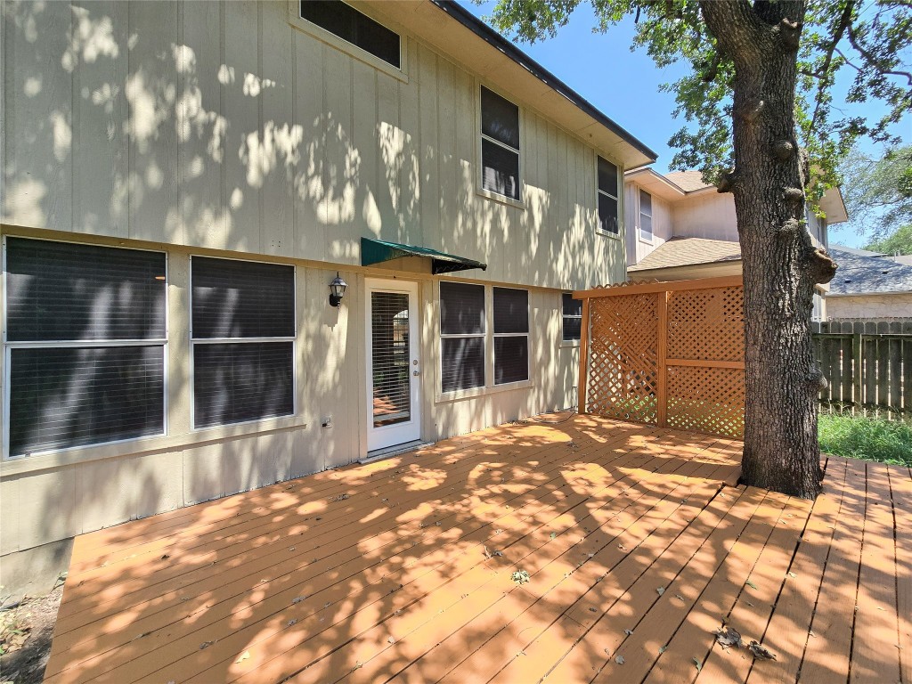8021 Rimini Trail Austin, TX 78729 - Photo 3 of 26 a view of a house with a yard