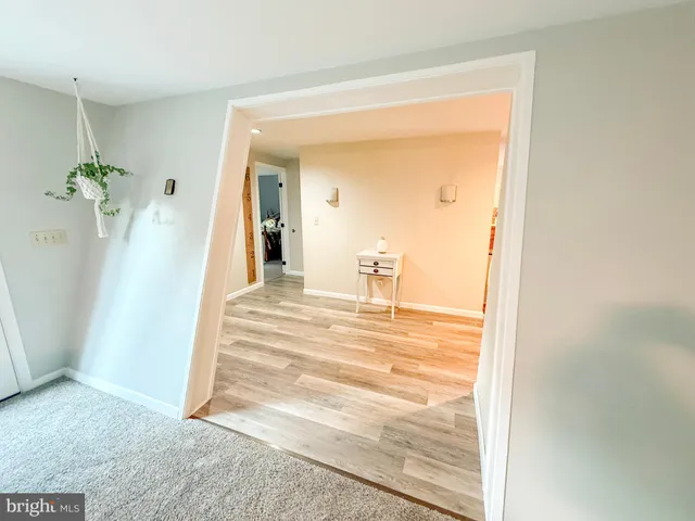 a view of a living room and dining room