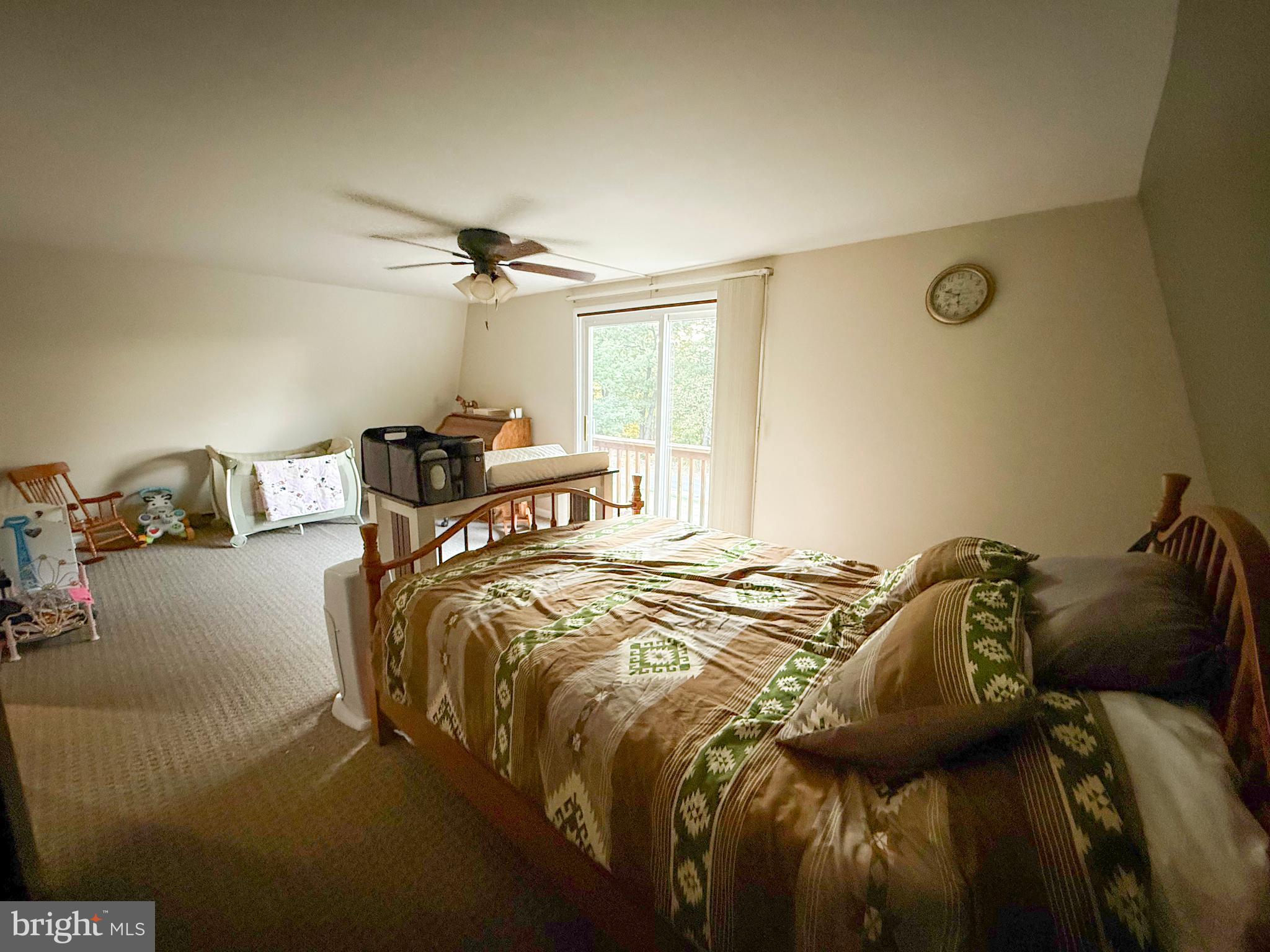 78 Fairview Road Belleville, PA 17004 - Photo 36 of 57 a bed sitting in a bedroom next to a window