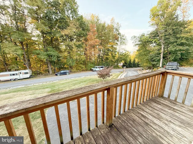 a bathroom with a sink toilet and a mirror