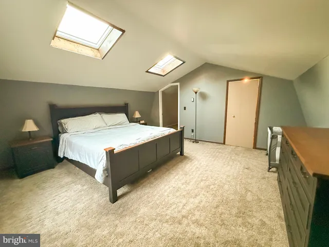 a view of a bike storage and utility room