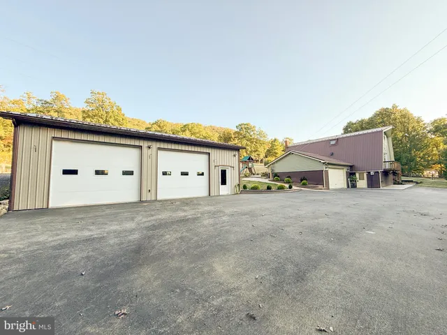 a view of a house with a garage