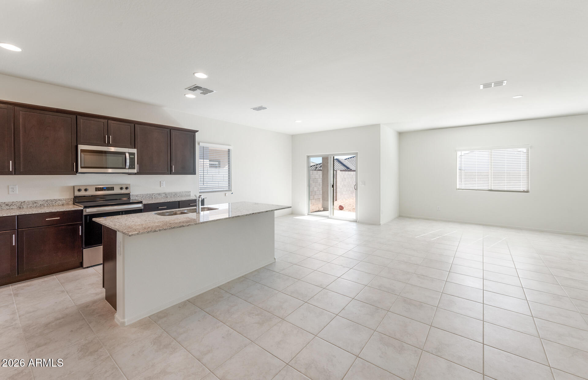 43020 West Palo Amarillo Road Maricopa, AZ 85138 - Photo 6 of 20 5 - Kitchen and Gathering Room