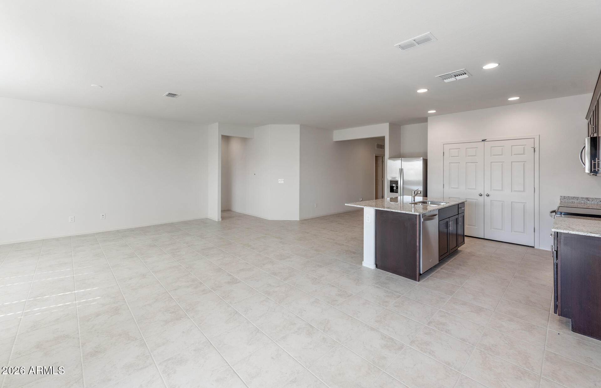 43020 West Palo Amarillo Road Maricopa, AZ 85138 - Photo 7 of 20 6 - Gathering Room and Kitchen