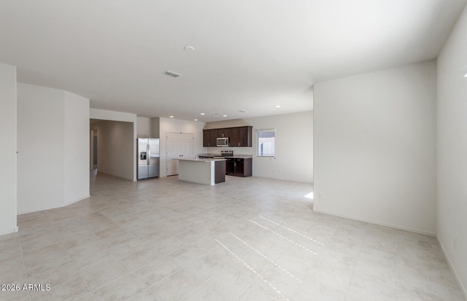 43020 West Palo Amarillo Road Maricopa, AZ 85138 - Photo 8 of 20 7 - Gathering Room and Kitchen