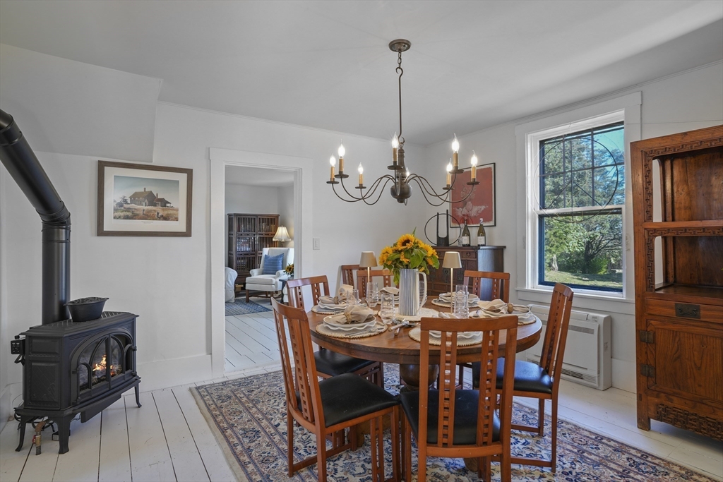 187 Lagoon Pond Road Tisbury, MA 02568 - Photo 12 of 27 a view of a dining room with furniture window and wooden floor