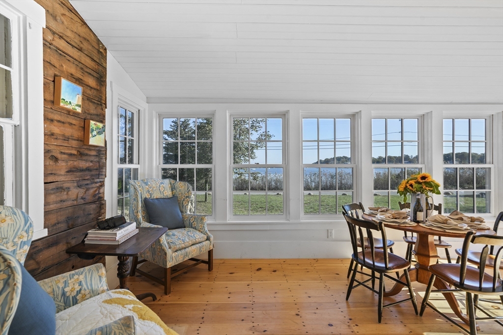 187 Lagoon Pond Road Tisbury, MA 02568 - Photo 8 of 27 a living room with furniture and a window