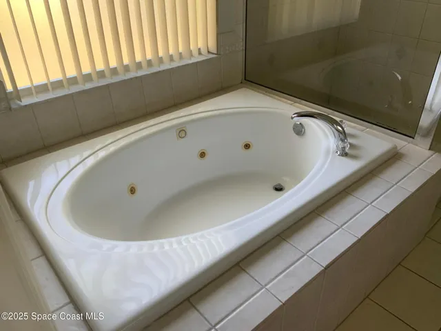 a bath tub sitting in a bathroom