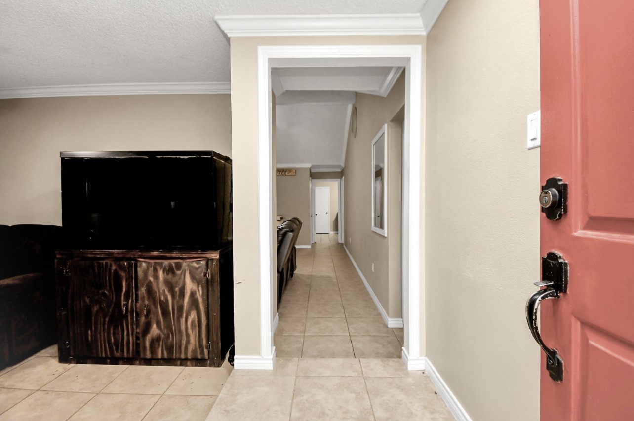 712 Meadowick Drive Baytown, TX 77521 - Photo 4 of 21 a view of a living room with a bathroom