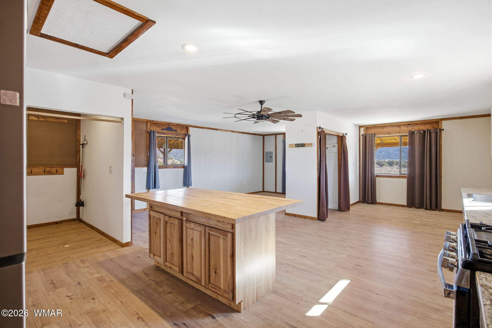 4306 El Dorado Road Snowflake, AZ 85937 - Photo 14 of 35 a view of a kitchen with a sink and a refrigerator