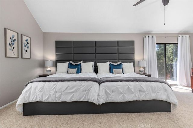 a bathroom with a shower sink and mirror