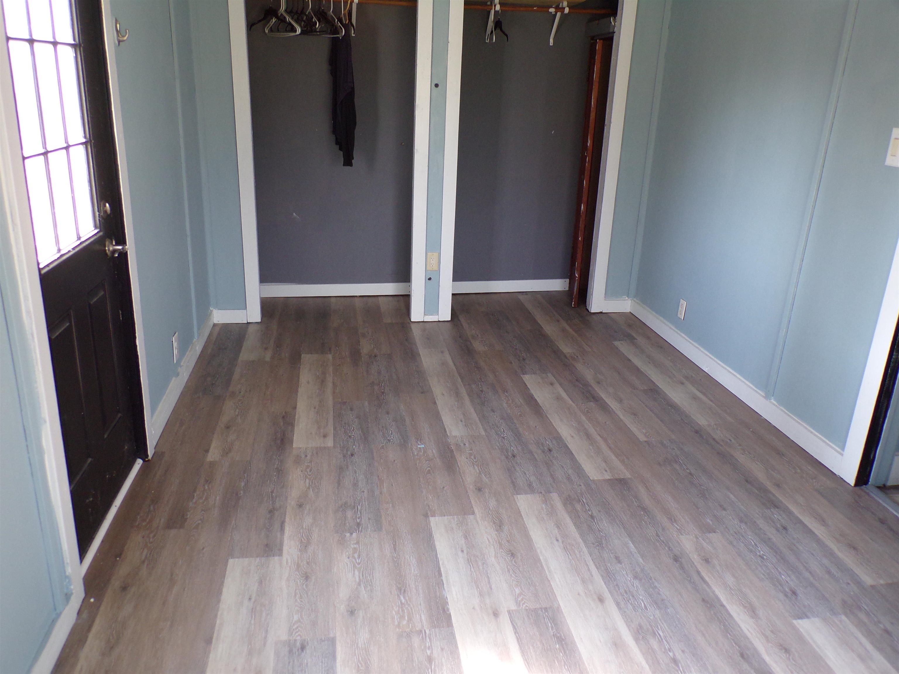 5950 Highway 57 Counce, TN 38326 - Photo 17 of 23 Unfurnished bedroom with baseboards and light wood-style floors