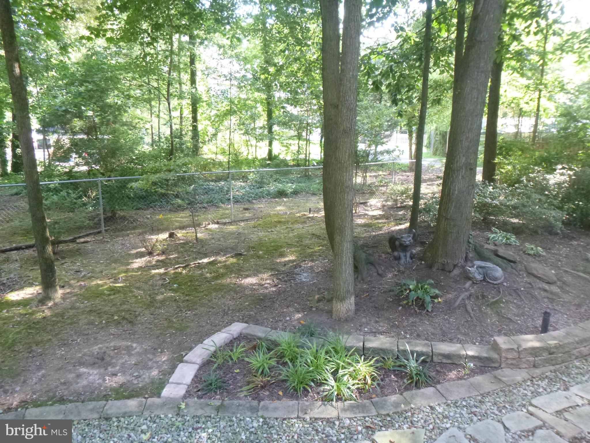 7214 Tanager Street Springfield, VA 22150 - Photo 29 of 30 View from Deck - yard extends beyond fence