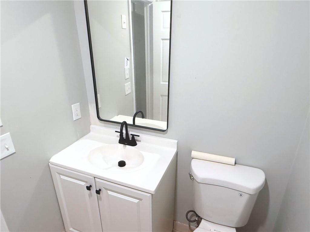 2870 Horseshoe Bend Road Southwest Marietta, GA 30064 - Photo 16 of 21 a bathroom with a sink and a mirror