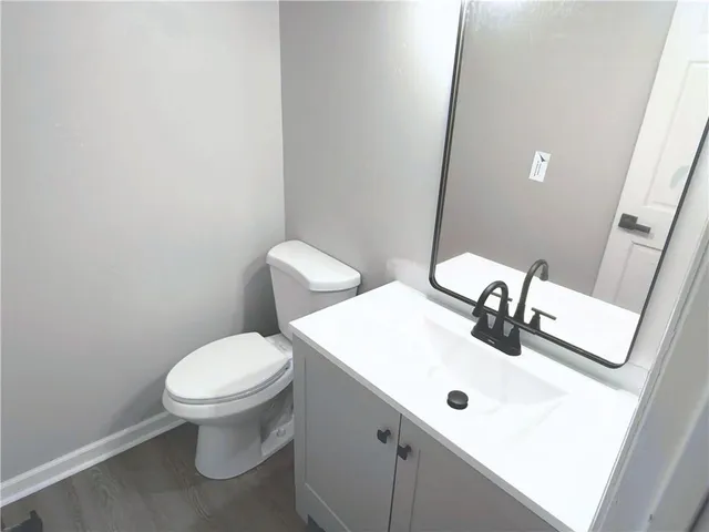 a bathroom with a sink and a toilet