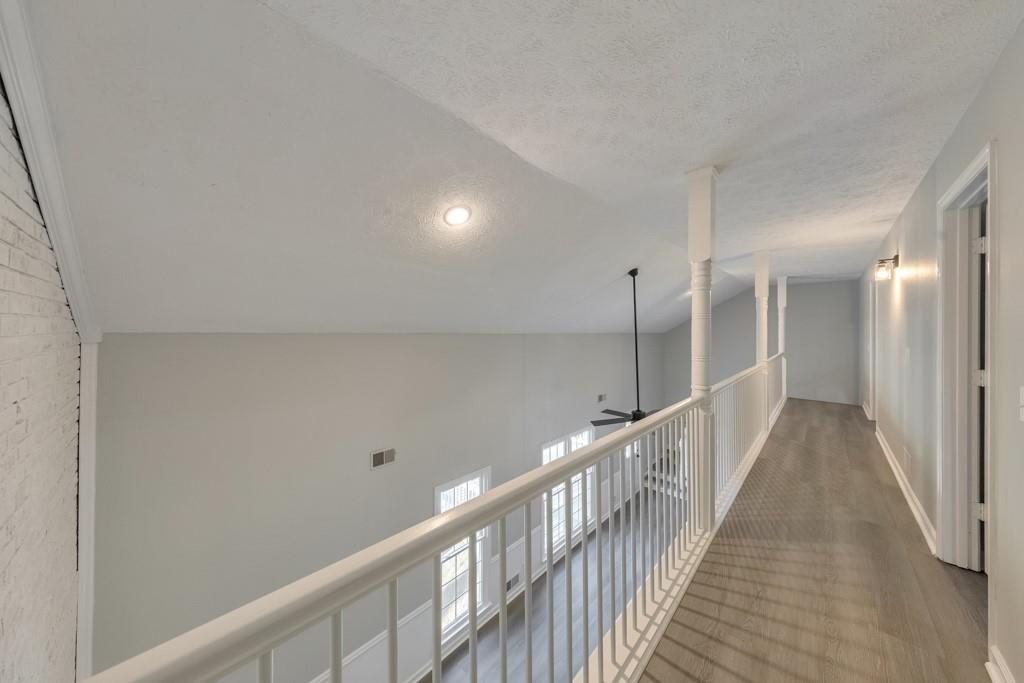 2870 Horseshoe Bend Road Southwest Marietta, GA 30064 - Photo 19 of 37 a view of a hallway with wooden floor