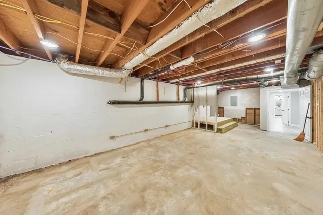 a view of balcony with wooden floor and fence