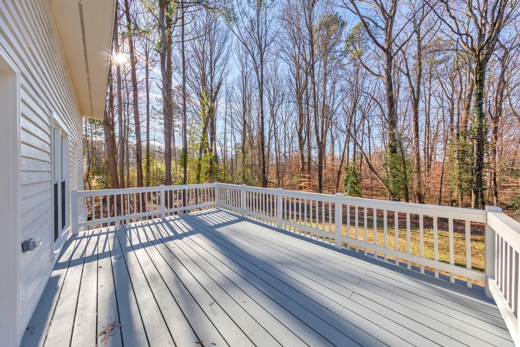 2870 Horseshoe Bend Road Southwest Marietta, GA 30064 - Photo 34 of 37 a view of balcony with wooden floor and fence