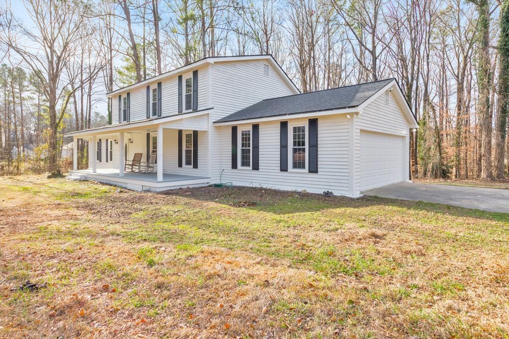 2870 Horseshoe Bend Road Southwest Marietta, GA 30064 - Photo 4 of 37 a house view with swimming pool in front of it