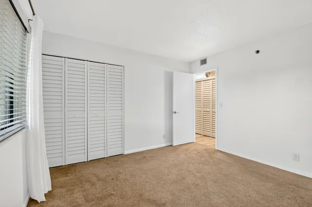 an empty room with closet