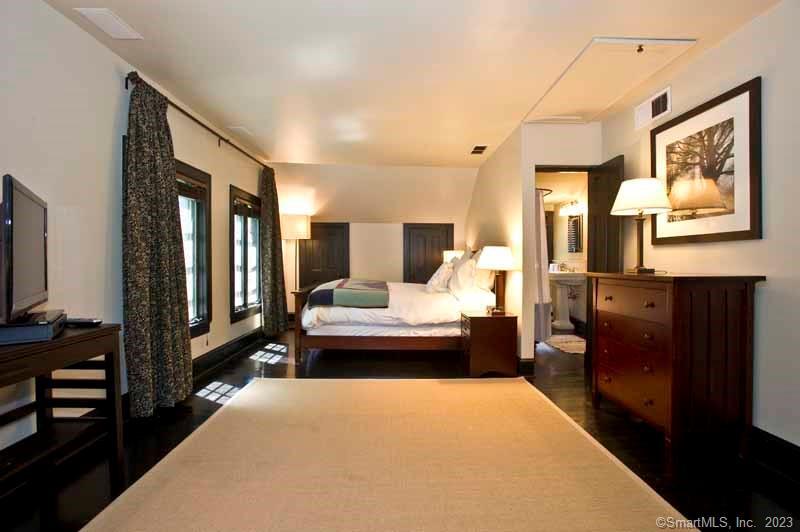 17 Kirby Road Washington, CT 06793 - Photo 3 of 20 a bedroom with furniture and a flat screen tv