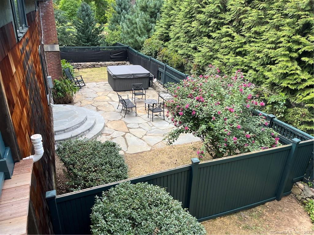 17 Kirby Road Washington, CT 06793 - Photo 9 of 20 a balcony with wooden floor and outdoor seating