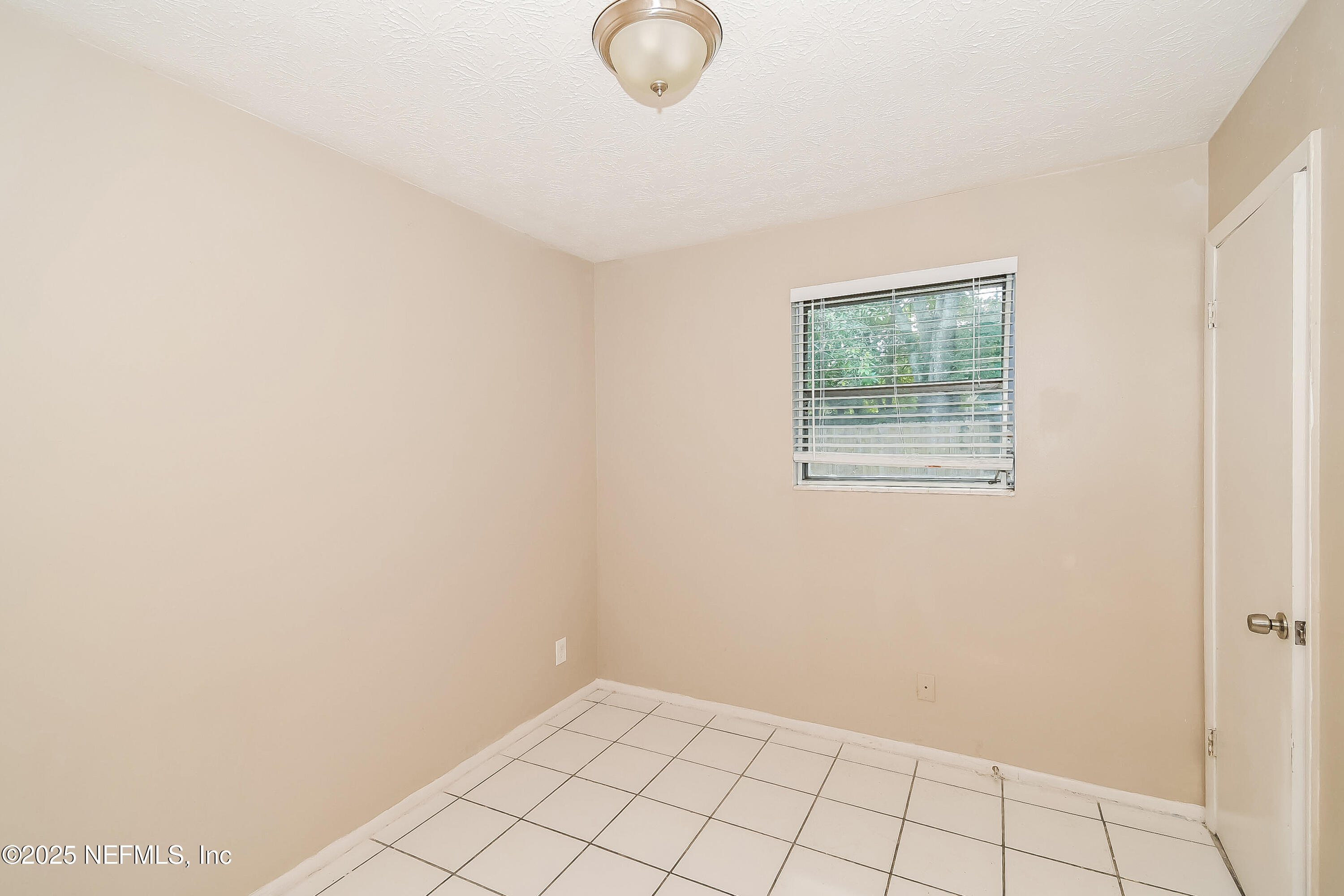 6430 Lucente Drive Jacksonville, FL 32210 - Photo 12 of 15 a view of an empty room