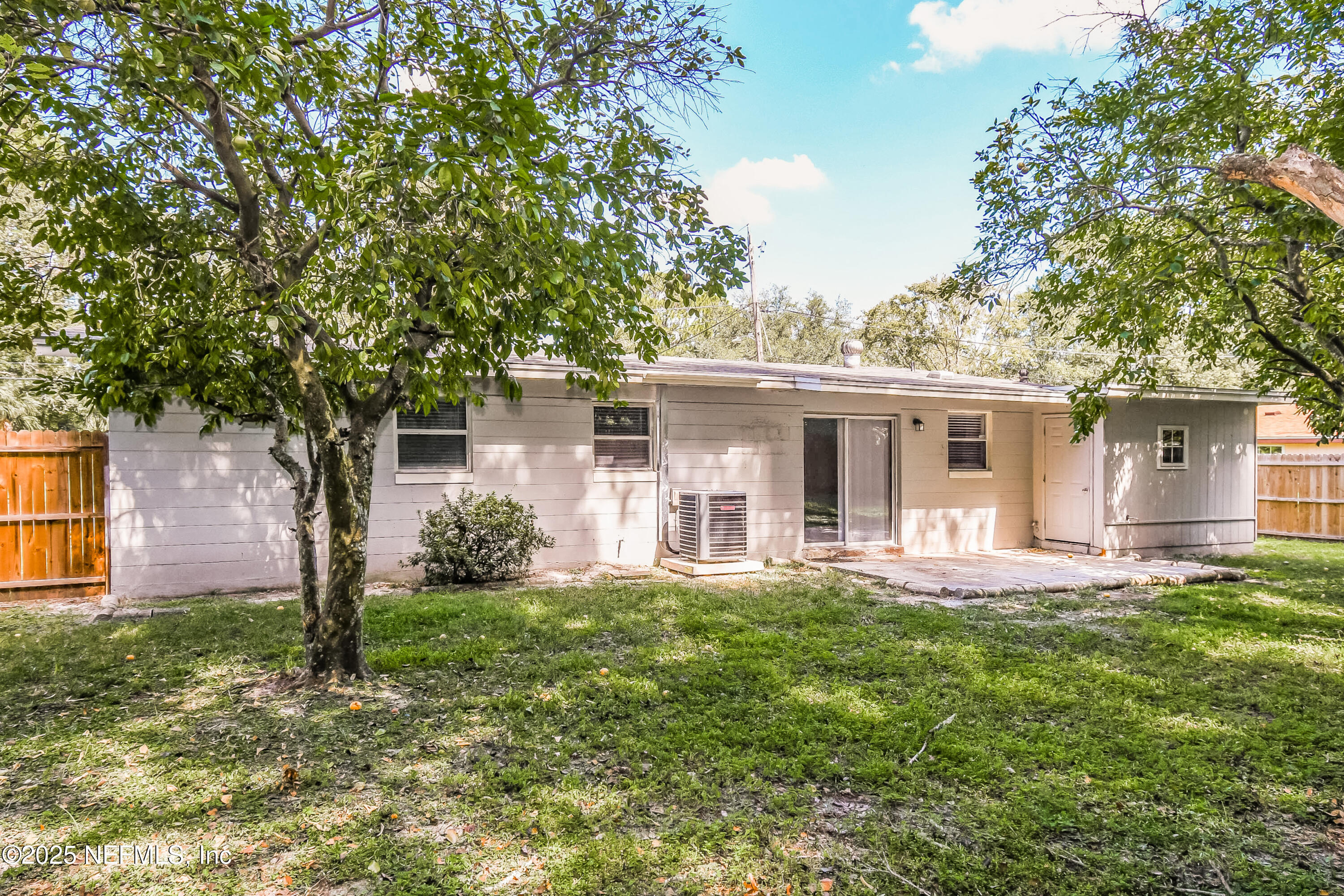 6430 Lucente Drive Jacksonville, FL 32210 - Photo 15 of 15 front view of a house with a yard
