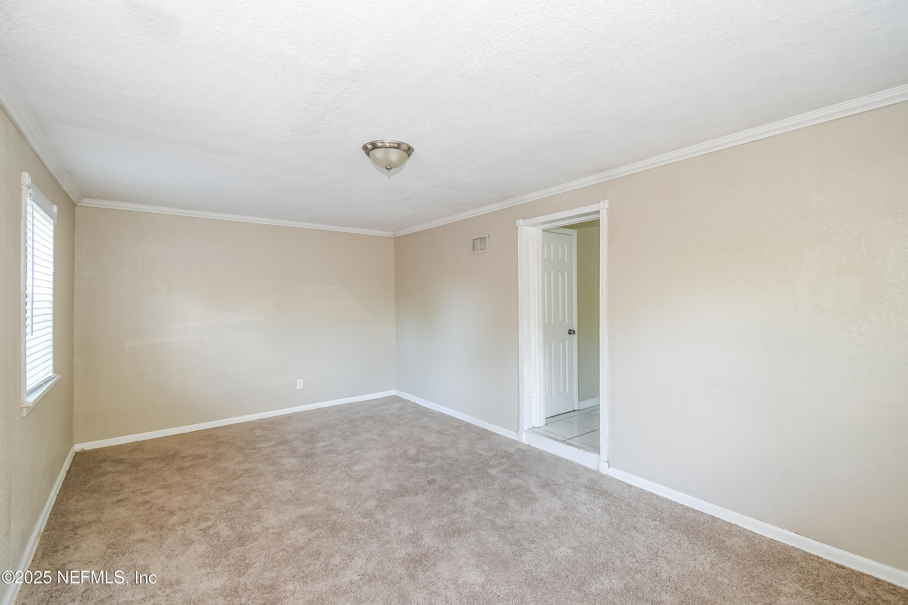 6430 Lucente Drive Jacksonville, FL 32210 - Photo 7 of 15 a view of an empty room
