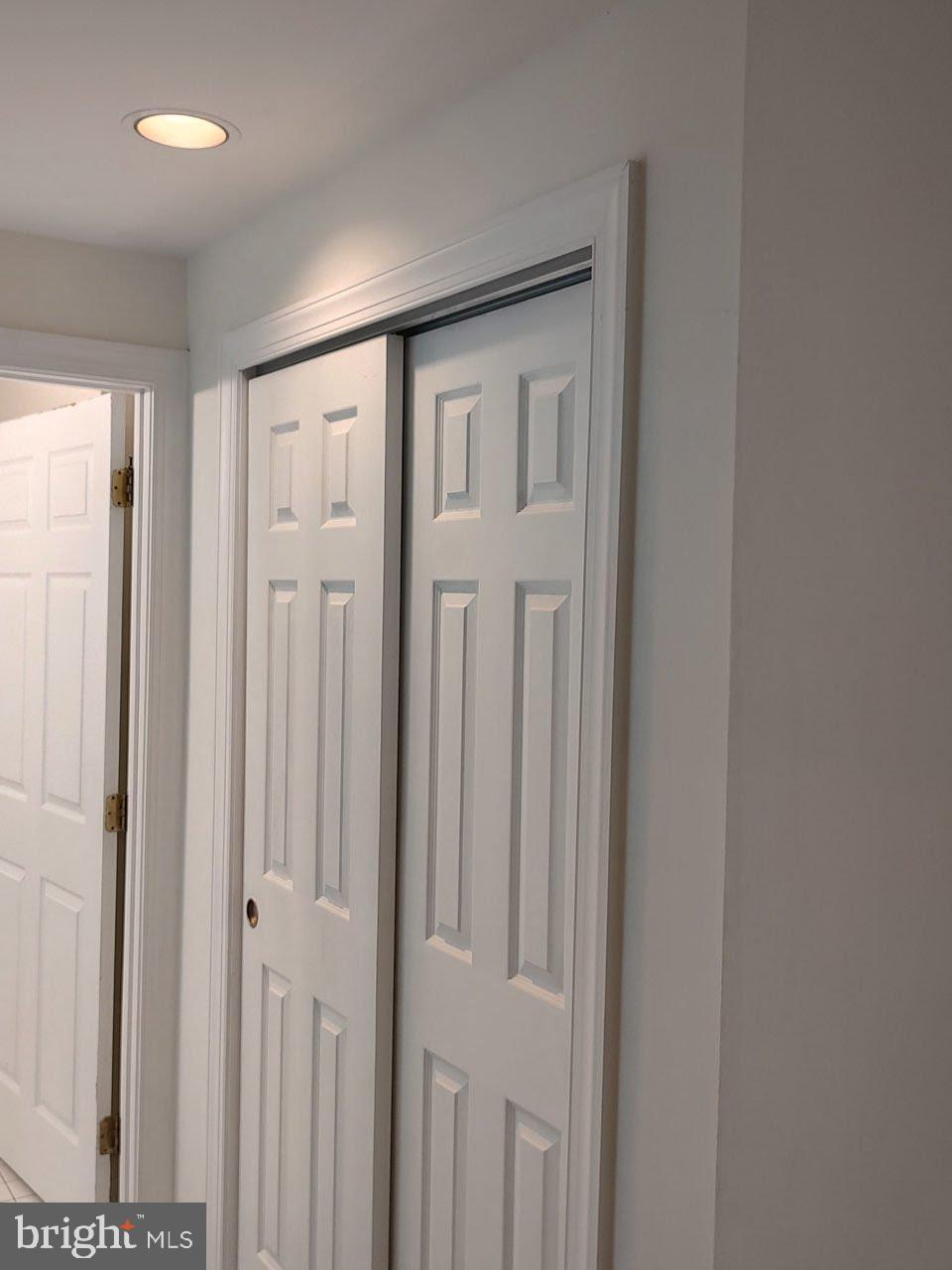 6529 Garden Grove Way Gaithersburg, MD 20882 - Photo 8 of 14 a view of a hallway with wooden floor