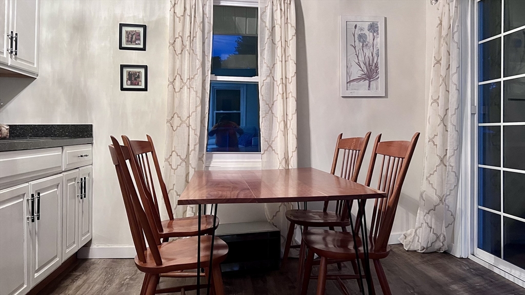 12 Temple Avenue Hudson, MA 01749 - Photo 21 of 32 a view of a dining room with furniture and wooden floor