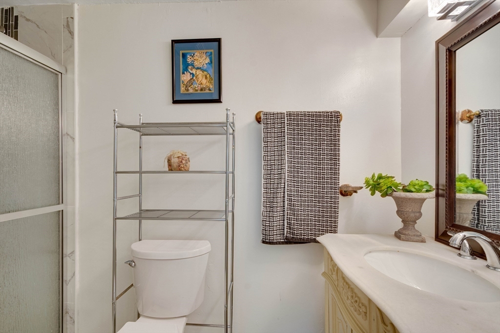 12 Temple Avenue Hudson, MA 01749 - Photo 23 of 32 a bathroom with a sink toilet and shower