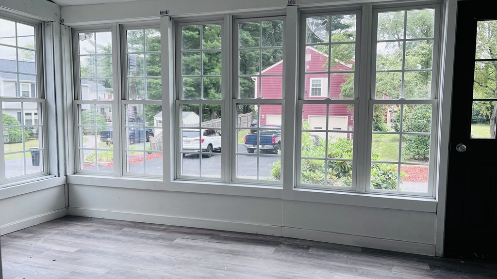 12 Temple Avenue Hudson, MA 01749 - Photo 25 of 32 a view of empty room with large windows