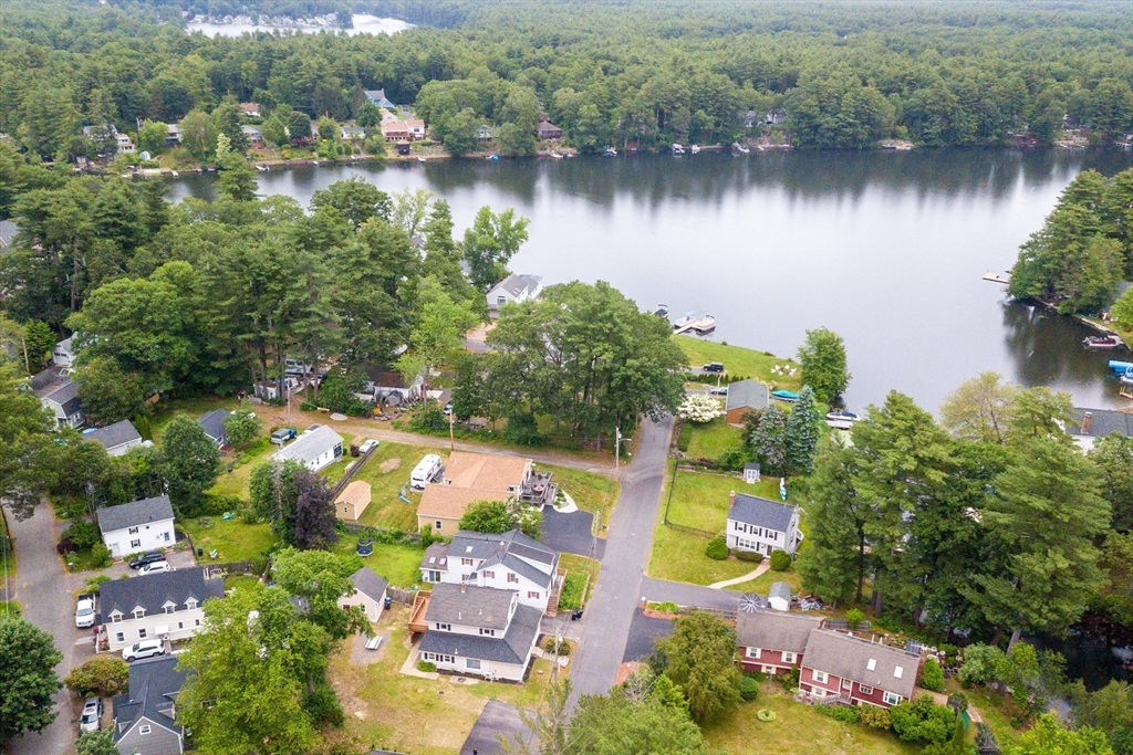 12 Temple Avenue Hudson, MA 01749 - Photo 3 of 32 an aerial view of lake and residential houses with outdoor space and lake view