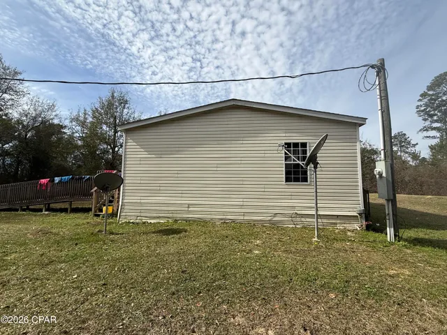 $104,900 | 7868 Home Front Road, Sneads, FL 32460