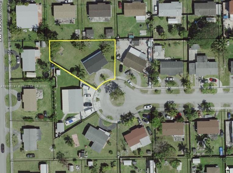 14535 Southwest 297th Terrace Homestead, FL 33033 - Photo 17 of 17 an aerial view of houses with outdoor space