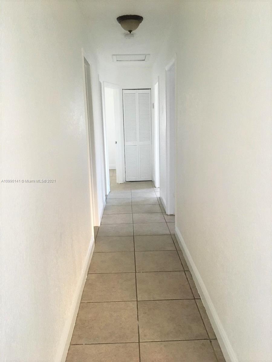 14535 Southwest 297th Terrace Homestead, FL 33033 - Photo 8 of 17 a view of a hallway