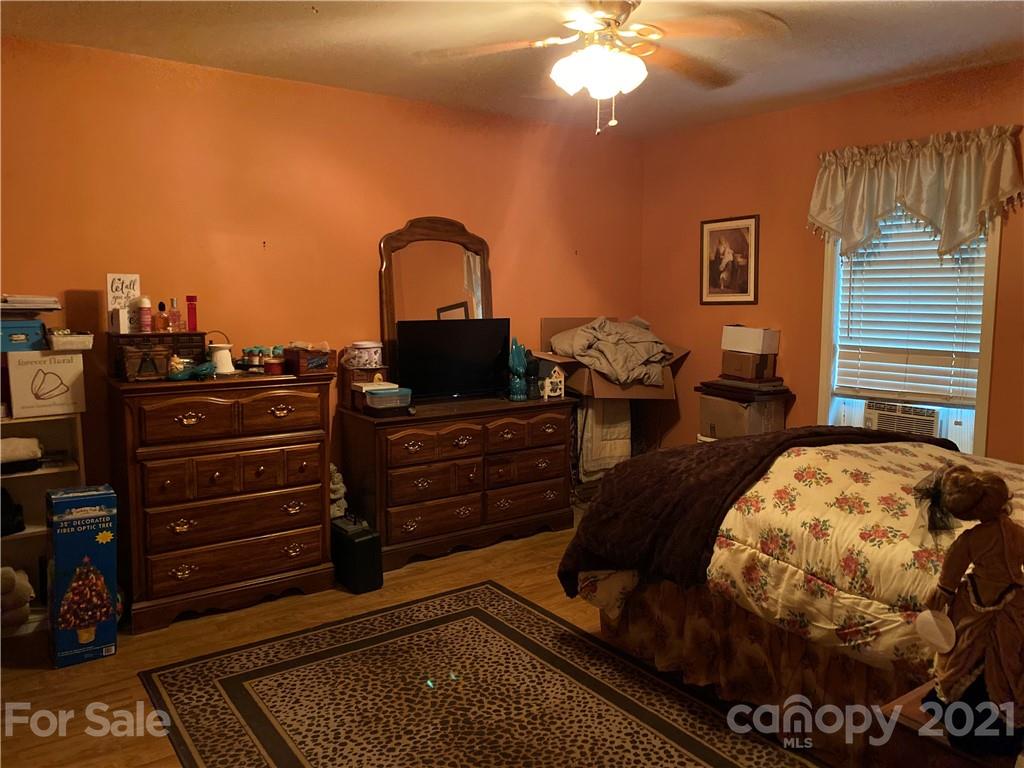 1033 Tabor Road Olin, NC 28660 - Photo 5 of 14 a living room with furniture
