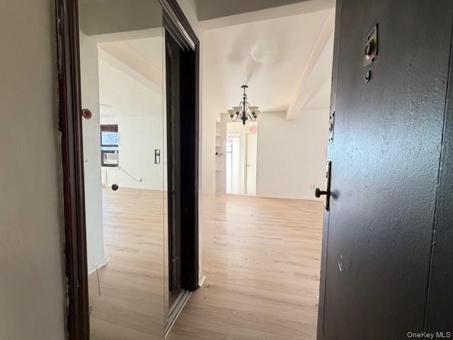 75-08 Bell Boulevard, Unit 2J Queens, NY 11364 - Photo 12 of 23 a view of a bathroom from the hallway