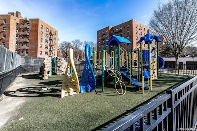 75-08 Bell Boulevard, Unit 2J Queens, NY 11364 - Photo 19 of 23 a view of a house with a park