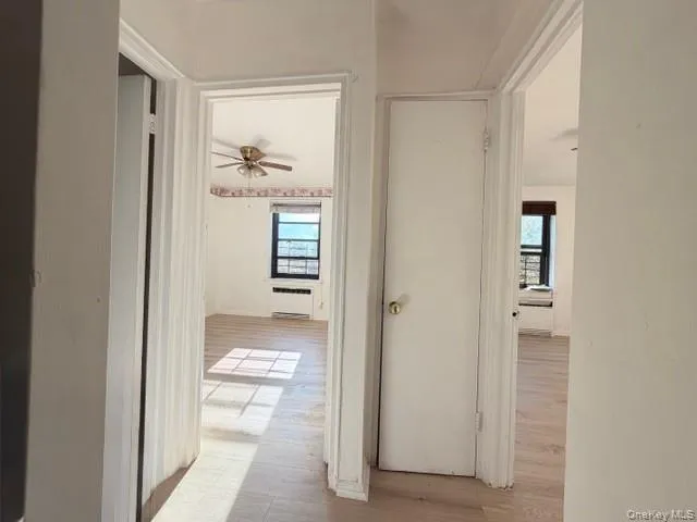 a view of gallery with windows