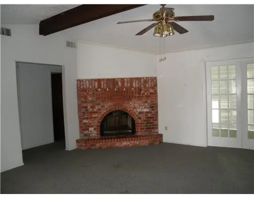 a living room with a fireplace
