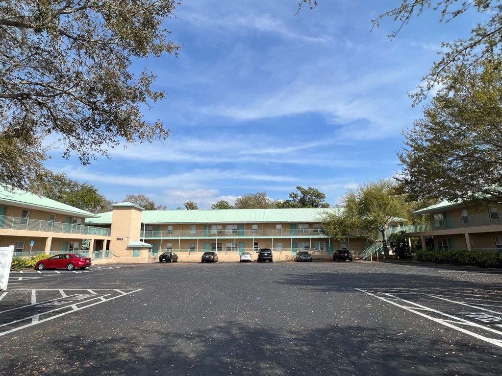 5822 Congress Street, Unit 101 New Port Richey, FL 34653 - Photo 1 of 1 Front of building-tons of parking