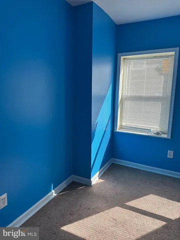 a view of an empty room with window